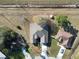 An aerial view of the property shows the home's location within a quiet, well-maintained neighborhood at 746 Platypus Ct, Kissimmee, FL 34759