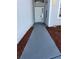 Inviting entryway to the residence, accented with fresh mulch and a newly painted walkway at 746 Platypus Ct, Kissimmee, FL 34759