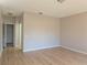 Bright living room boasts neutral walls and light-colored flooring at 746 Platypus Ct, Kissimmee, FL 34759