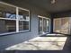 Covered patio with concrete flooring and sliding glass doors at 746 Platypus Ct, Kissimmee, FL 34759