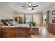 Inviting bedroom showcasing warm colors, hardwood floors, and natural light at 768 Canberra Rd, Winter Haven, FL 33884
