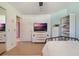 Bedroom with serene decor, featuring a modern dresser, and comfortable furnishings at 768 Canberra Rd, Winter Haven, FL 33884