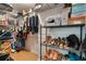 Organized walk-in closet with shelving and hanging space for clothes, shoes and accessories at 768 Canberra Rd, Winter Haven, FL 33884