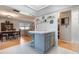 Bright kitchen area features a breakfast bar overlooking the dining and living areas at 768 Canberra Rd, Winter Haven, FL 33884