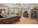 Spacious bedroom featuring a ceiling fan, natural light, and decorative furnishings at 768 Canberra Rd, Winter Haven, FL 33884
