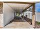 Covered carport with concrete flooring at 811 Bonnie Dr, Lakeland, FL 33803