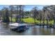 Lakefront property with private dock and boat lift at 8323 W Lake Marion Rd, Haines City, FL 33844