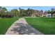 Paved driveway leading to a luxurious home at 8323 W Lake Marion Rd, Haines City, FL 33844
