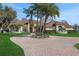 Beautiful lakefront home with circular driveway and lush landscaping at 8323 W Lake Marion Rd, Haines City, FL 33844