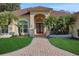 Inviting entryway with double doors and a brick walkway at 8323 W Lake Marion Rd, Haines City, FL 33844