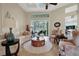 Spacious living room with lake view and comfortable seating at 8323 W Lake Marion Rd, Haines City, FL 33844