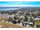 Aerial view showcasing the community's landscape and lake proximity at 834 Avenue I Ne, Winter Haven, FL 33881