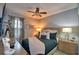 Charming bedroom with a queen bed and stylish decor at 918 Revere Ave, Haines City, FL 33844