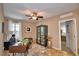 Bright home office features built-in shelving and a large desk at 918 Revere Ave, Haines City, FL 33844