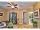 Spacious home office with hardwood floors and an adjacent bathroom at 918 Revere Ave, Haines City, FL 33844