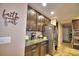 Kitchen with granite countertops and stainless steel appliances at 918 Revere Ave, Haines City, FL 33844