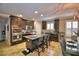 Spacious kitchen with dark cabinetry, stainless steel appliances, and an island at 918 Revere Ave, Haines City, FL 33844