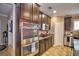Modern kitchen with stainless steel appliances and granite countertops at 918 Revere Ave, Haines City, FL 33844