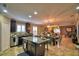 Spacious kitchen with island, stainless steel appliances, and dark wood cabinets at 918 Revere Ave, Haines City, FL 33844