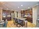 Open concept kitchen with stainless steel appliances and granite countertops at 918 Revere Ave, Haines City, FL 33844