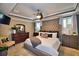 Spacious main bedroom with large bed and plenty of storage at 918 Revere Ave, Haines City, FL 33844