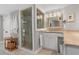 Bright bathroom featuring a glass shower, vanity with granite countertop, and neutral color palette at 1 Casarena Ct, Winter Haven, FL 33881