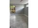 Bright bedroom with neutral walls, tiled floor, and window view at 1 Casarena Ct, Winter Haven, FL 33881