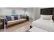 Well-lit bedroom featuring a daybed, comfortable furniture, and stylish decor at 1 Casarena Ct, Winter Haven, FL 33881