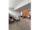 Bright living room with neutral furniture, tile flooring, and open layout at 1 Casarena Ct, Winter Haven, FL 33881