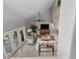 Open living room area with tile floor, and high ceiling at 1 Casarena Ct, Winter Haven, FL 33881