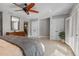 Spacious main bedroom with multiple closets and a walk-through to the ensuite bath at 1 Casarena Ct, Winter Haven, FL 33881