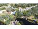 Aerial view of the neighborhood and the lakefront house at 1048 Sunset Trail, Babson Park, FL 33827