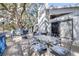 Outdoor deck with a glass-topped table, plenty of seating and a view at 1048 Sunset Trail, Babson Park, FL 33827