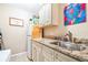 Laundry area features counters, cabinets, and fridge at 1048 Sunset Trail, Babson Park, FL 33827