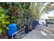 Water filtration and softening system for the home, with pressure tank, filters, and controls on wooden deck near the water at 1048 Sunset Trail, Babson Park, FL 33827