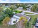 Aerial view of the home with mature landscaping and a private backyard at 106 Lake Sears Dr, Winter Haven, FL 33880