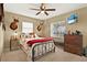 Bedroom with decorative accents, neutral walls, and ample natural light at 106 Lake Sears Dr, Winter Haven, FL 33880