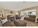 Spacious living room with comfortable seating, neutral colors, and abundant natural light provides an inviting gathering space at 106 Lake Sears Dr, Winter Haven, FL 33880