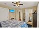 The main bedroom features a TV, closet, and an ensuite bathroom at 106 Lake Sears Dr, Winter Haven, FL 33880