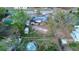 Aerial view of the home and backyard including structures and above ground pool at 115 Jefferson St, Lake Wales, FL 33859