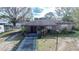 Exterior view of the home from above, showing its yard at 115 Jefferson St, Lake Wales, FL 33859