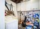 Laundry room with a washer, dryer, and overhead cabinets at 115 Jefferson St, Lake Wales, FL 33859