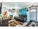 Comfortable living room featuring a leather sofa and a traditional homey decor at 115 Jefferson St, Lake Wales, FL 33859