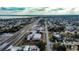 Aerial photo of home within its neighborhood, showing its proximity to roads, amenities, and landscaping at 115 Jefferson St, Lake Wales, FL 33859