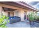 Covered porch featuring a comfortable seating area and views of the landscape at 115 Jefferson St, Lake Wales, FL 33859