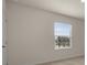 Bedroom with neutral paint color features a window with privacy blinds at 1157 Blue Jay Dr, Davenport, FL 33837