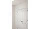 A white closet with double doors at 1157 Blue Jay Dr, Davenport, FL 33837