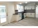 Modern kitchen with new cabinets, stainless steel appliances, and tile backsplash at 148 Lake Otis Rd, Winter Haven, FL 33884