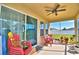 Cozy screened-in porch, perfect for relaxing and enjoying the outdoor view at 1510 Shorewood Dr, Auburndale, FL 33823