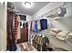 Well-organized walk-in closet featuring ample storage and shelving for clothing and accessories at 1510 Shorewood Dr, Auburndale, FL 33823